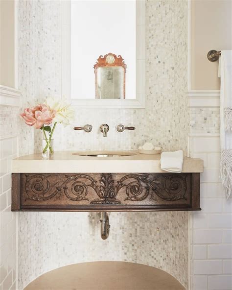 Malibu Spanish Colonial Powder Room Featuring White Marble Mosaic