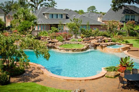 Create A Tropical Backyard With A Unique Pool