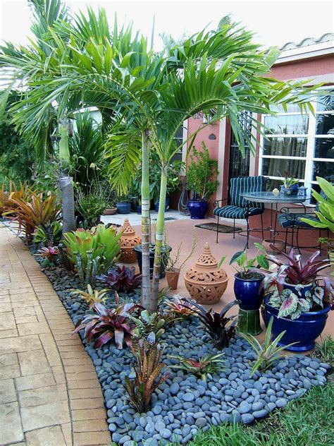 If your garden already contains landscaping rocks or pebbles, use the same or similar types so your edging doesn't look out of place. How To Decorate Flowerbeds With Pebbles And Rocks