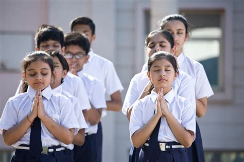 Students Praying In School Campus Stock Photo Download Image Now