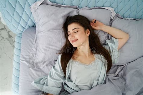 Beautiful Woman Sleeping In Comfort Bed Rest Bed Linen Stock Photo