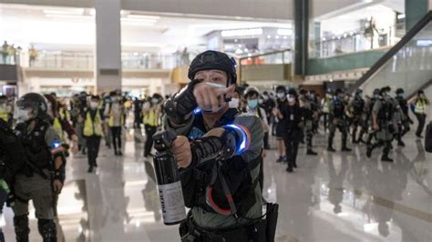Hong Kong Police Spray Tear Gas At Protesters Gathered In A Shopping