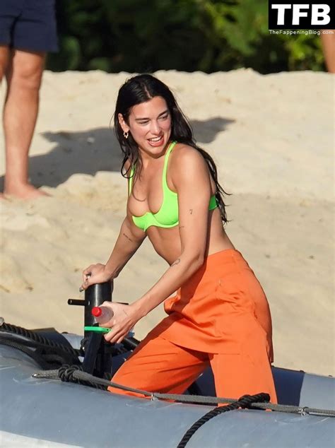 Dua Lipa Shows Off Her Bikini Body Tits While On Holiday In St