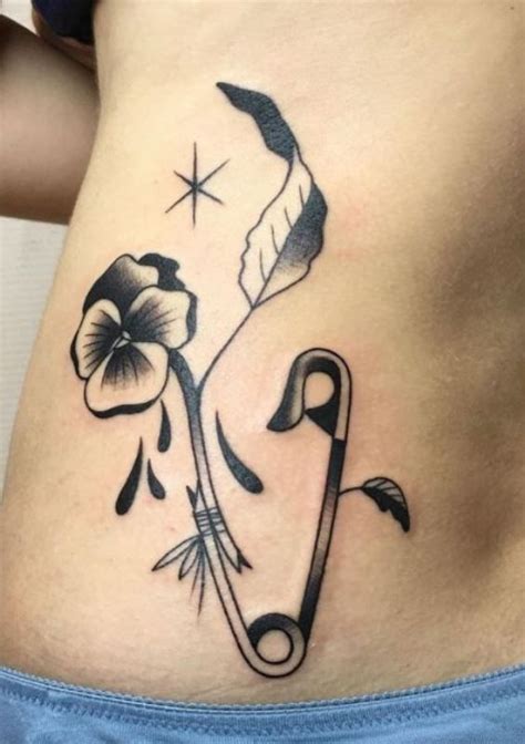 Exploring The Meaning Of A Safety Pin Tattoo A Guide To The Meaning
