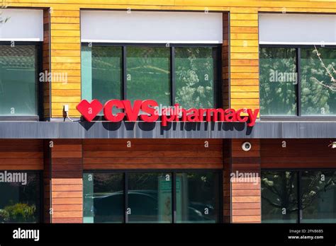 CVS Pharmacy logo and sign on drug store facade - San Jose, California