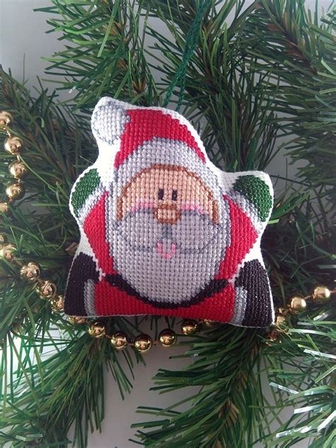 The patterns are produced by imaginating, just crossstitch, little house needleworks and others priced from $3.00 to $17.60. Christmas Ornament Cross Stitch Pattern - Santa Claus ...