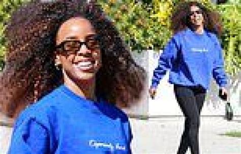 kelly rowland shows off toned legs in a pair of black leggings as she exits