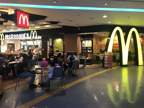Usually banks with this service have a yellow and black signboard as shown here. McDonald's - Berjaya Times Square, Kuala Lumpur