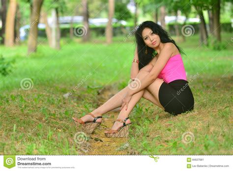 Sexual Young Woman Withlong Black Hair In A Bright Blouse Posing In Nature Stock Image Image