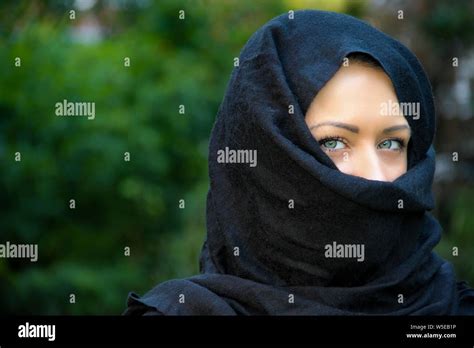 Beautiful Blue Eyed Muslim Lady Posing With Scarf On Her Head Stock