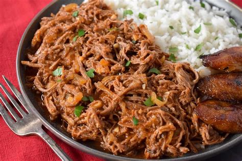 Ropa Vieja Is A Traditional Cuban Dish Made With Shredded Beef In A