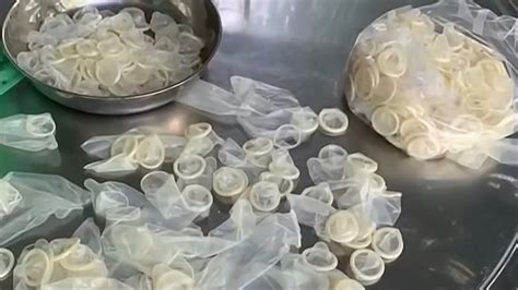 Factory Caught Washing And Reselling Used Condoms