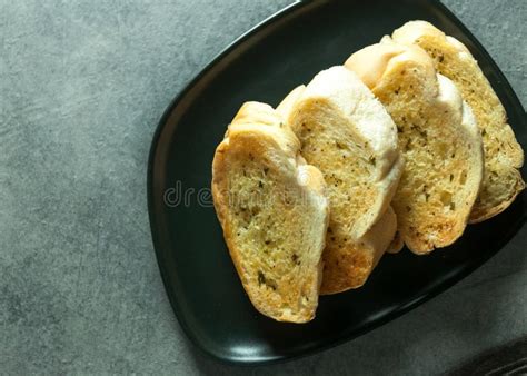 Garlic And Herb Bread Slices On The Table Tasty Bread With Garlic