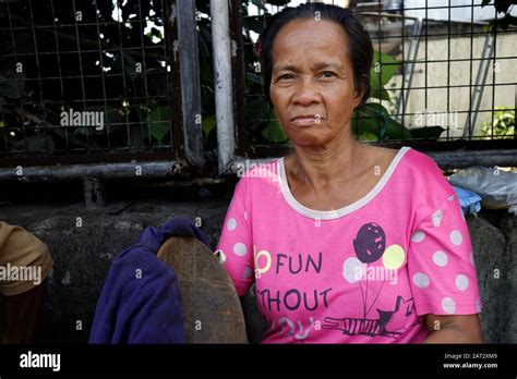 Antipolo City Philippines January 29 2020 An Adult Filipino Woman Sitting On A Sidewalk