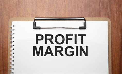 Profit Margin Text On White Paper On The Wood Table Stock Image Image