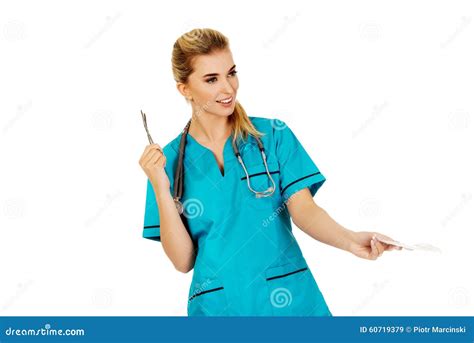 female nurse holding gauze and scissors stock image image of equipment holding 60719379