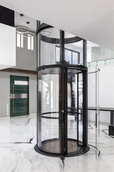 Vuelift Round Home Elevator Descends To Luxury Foyer Glass Elevator