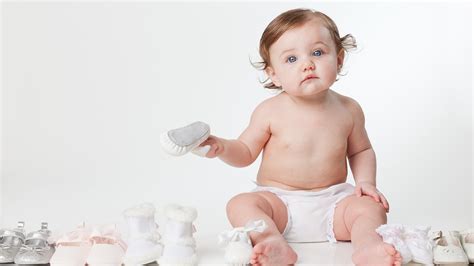 Cute Baby Is Playing With Footwears In White Background Hd Cute