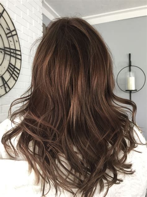 Also, this style can boost your hair volume and shine to the next level. brown medium length hair with lowlights | Low lights hair ...