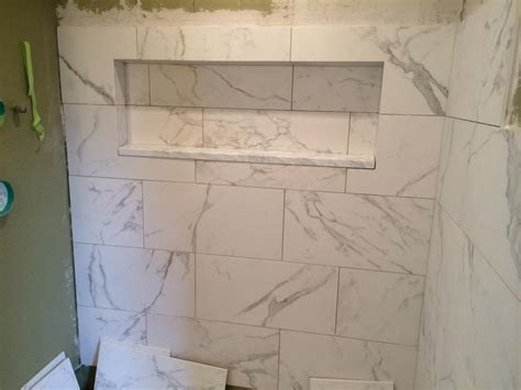 Over the weekend i installed a 3 hex, honed marble floor tile. carrara with white or dark grout - Google Search (With images) | Master shower, Carrara, Home decor
