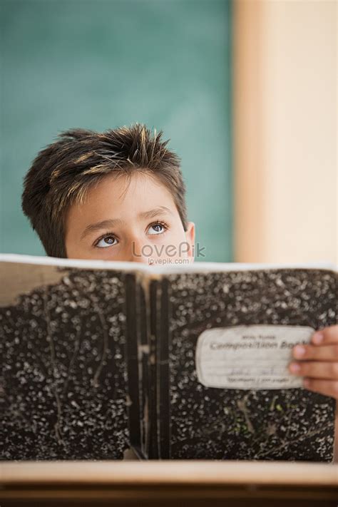 Schoolboy Holding Textbook Picture And Hd Photos Free Download On Lovepik