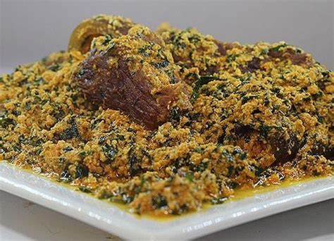 Egusi soup made the nigerian way with red palm oil and different kinds of meats. How to prepare Ghana egusi soup with spinach - Jetsanza.com