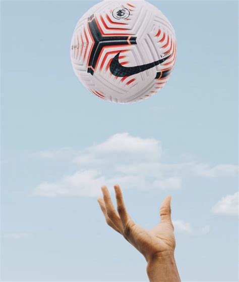 The premier league ball 2020/21 is mainly white with a black and red upper graphic. Premier League launches 2020/21 season match ball | GH ...