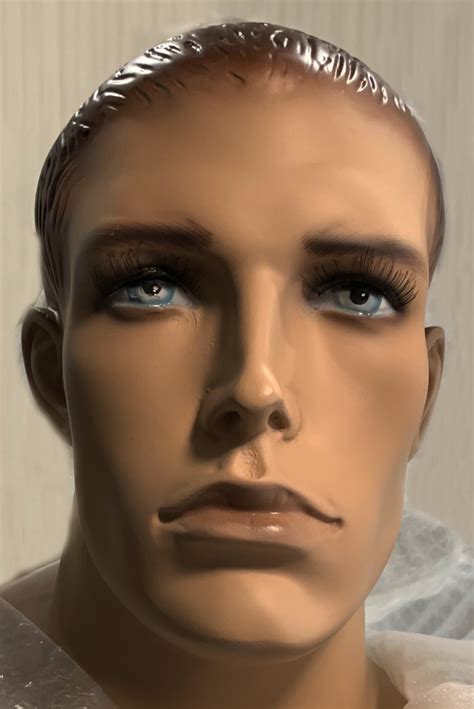 Male Mannequin with Realistic Facial Features and Molded Hair