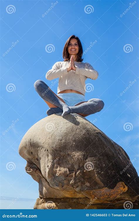 Woman Meditating On A Rock Stock Image Image Of Yoga