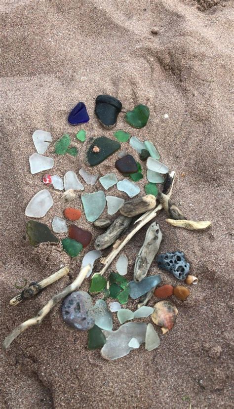 Sea Glass And Driftwood On The Beach