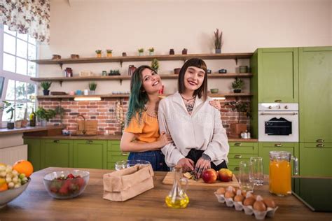 Charismatic Two Young Ladies Lesbian Couple In The Morning Get The Breakfast Together At Home In