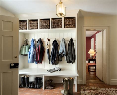 Saving Small And Narrow Entryway Spaces With White Wood Wall Built In
