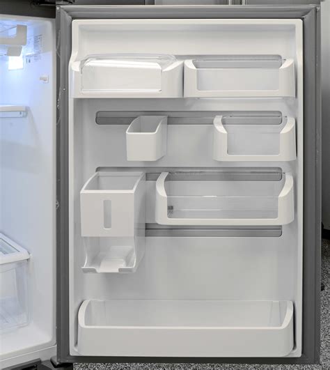 Once finished with these adjustments, reattach the bottom panel if necessary and reload groceries into the refrigerator and doors. Frigidaire Gallery FGHI2164QF Refrigerator Review ...