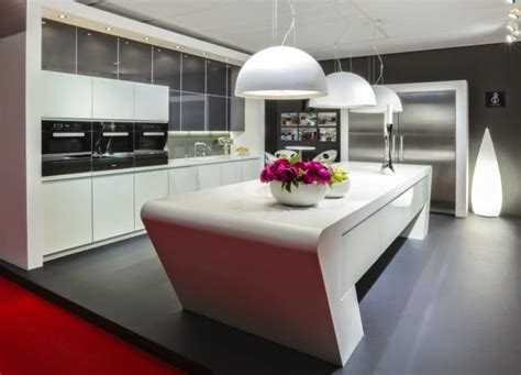Their striking designs are ultra modern, futuristic even, yet grounded in natural or environmentally another modern styled kitchen, showcasing an efficient use of space with sliding white doors able with this image we have another great white paneled storage wall, facing a black and grey island with. 20 Ultra modern kitchen designs and ideas for inspiration ...