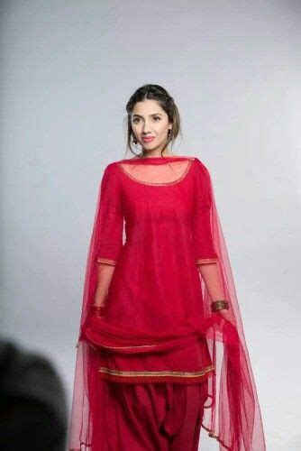 Indian fashion brand has offered the simple suits designs with elegant crochet motifs adorned long necklines and net sleeves. wonderful suit, with net dupatta... i m making it for me ...