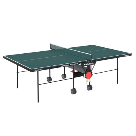 The Ping Pong Table Is Set Up With Two Paddles
