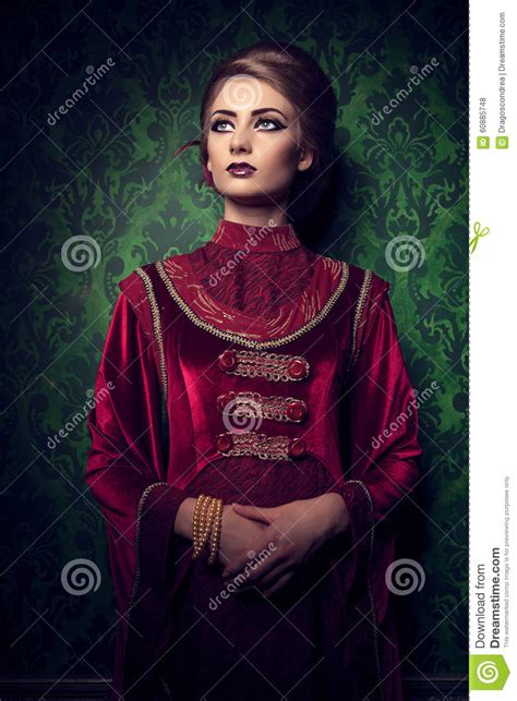 Aristocratic Woman In Vintage Clothes On Rococ Period Pattern Stock