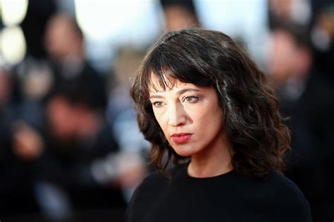 Asia argento has a warrior mermaid full back tattoo with three lotus flowers, a heart at the bottom, and lots of swirls and geometric patterns. Asia Argento, Jimmy Bennett Encounter: Actress Says She ...