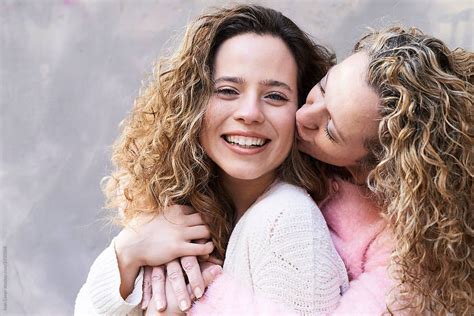Mother Kissing Smiley Daughter Stocksy United Mother Daughter Poses