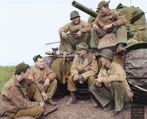 War Correspondent Ernie Pyle With An American Tank Crew From The 191st Tank Battalion In Front