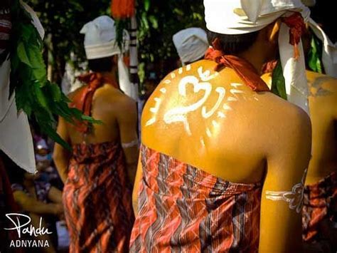 Ongkara Balinese Om Symbol On The Back Of A Performer At The Bali