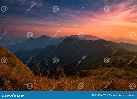 Sunset Scene With The Peak Of Mountain And Cloudscape At Phu Chi Stock