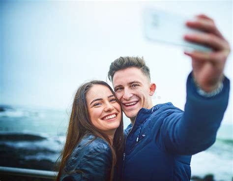 Nothing Says Love Like A Couple Selfie A Happy Young Couple Taking A