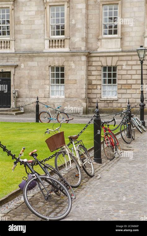 bicycle parking at courtyard trinity college in dublin ireland trinity college campus stock