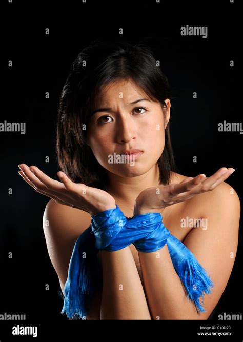 Asian Girl Tied Up Against Her Will Pleads For Release Stock Photo Alamy