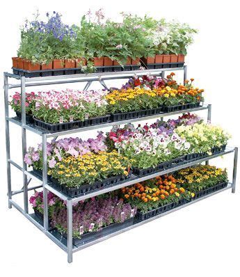 The authors sealed the plywood walls. Greenhouse Benches | Growing plants indoors, Grow lights for plants, Garden center displays
