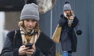 Lily James Cuts A Concerned Figure As She Talks Anxiously On The Phone