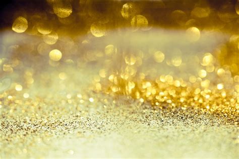 Premium Photo Golden Glitter Bokeh Lighting Texture Blurred Abstract