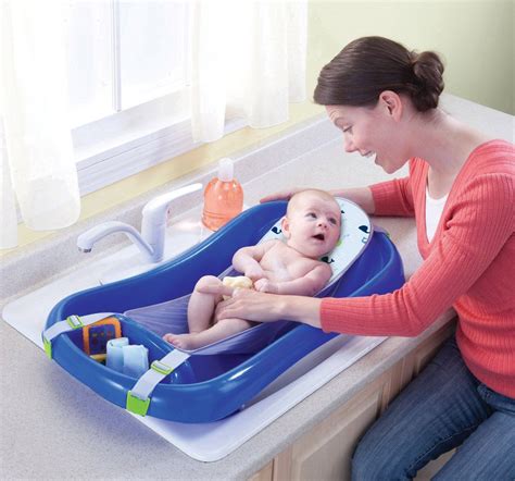 This bath tub for baby features an infant hammock like sling inside the tub and holds a growing baby better during bath time. NEW Newborn Adjustable Infant Baby Toddler Bath Tub Seat w ...