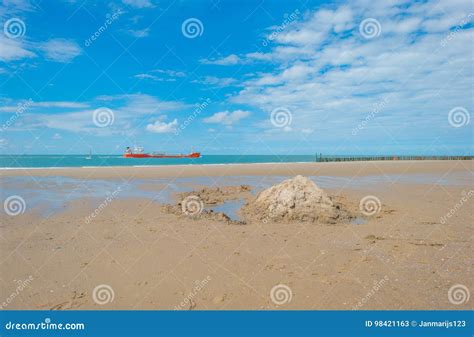 Blue Cloudy Sky Over A Sand Beach Along The Sea Stock Image Image Of